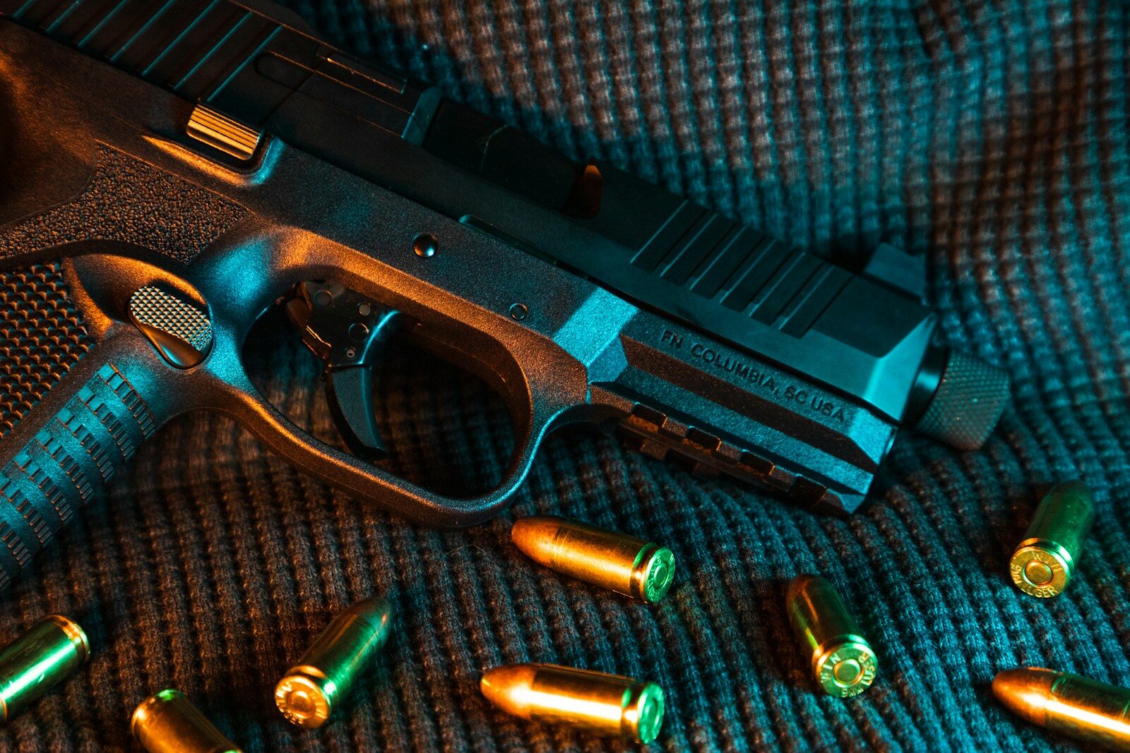 5 9mm Rounds as Good as or Better Than .45 ACP black and silver semi automatic pistol