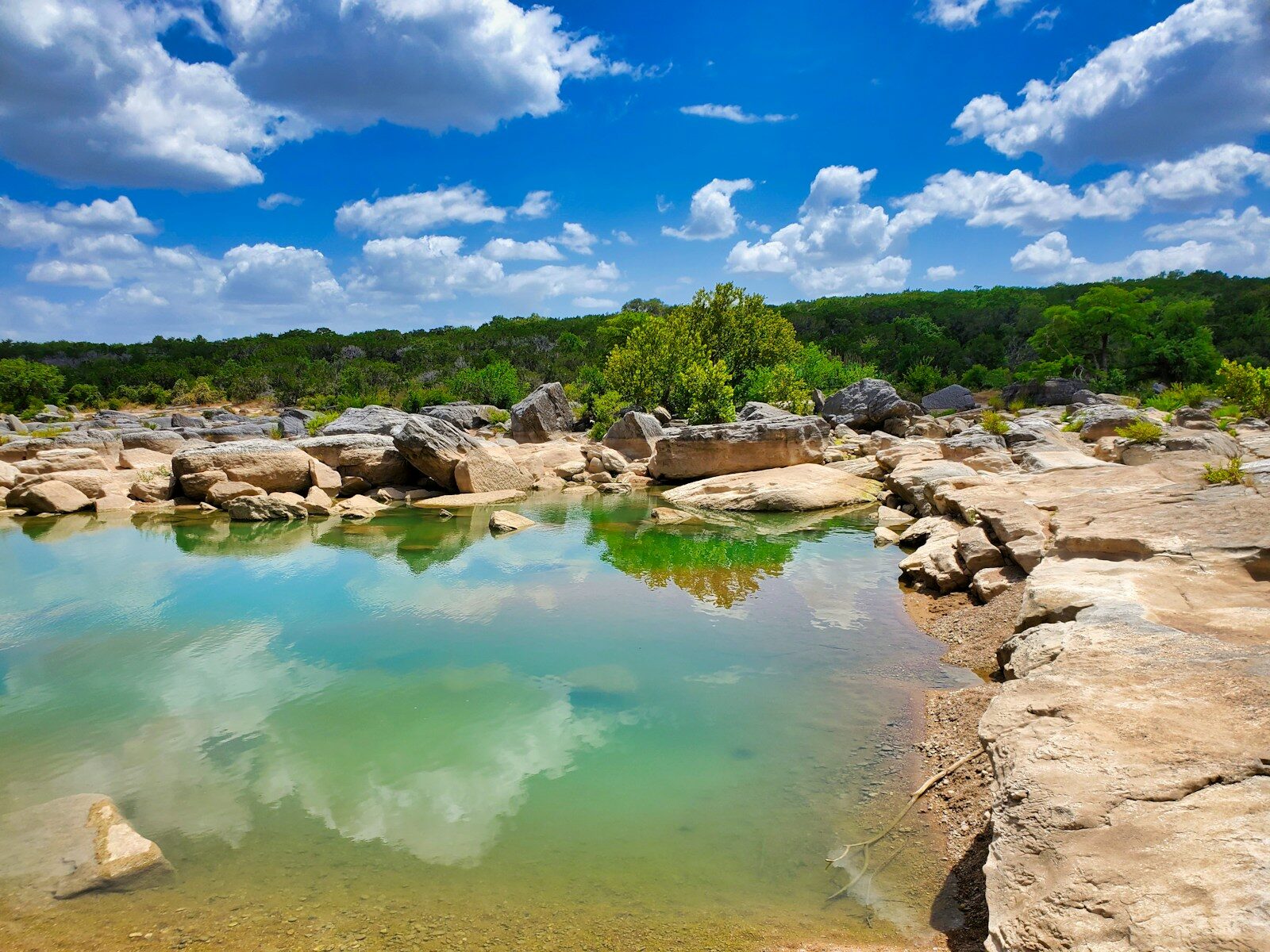6 Day Trips Worth Taking in Texas: Scenic Drives, Historic Towns, and Coastal Escapes green trees beside river under blue sky during daytime