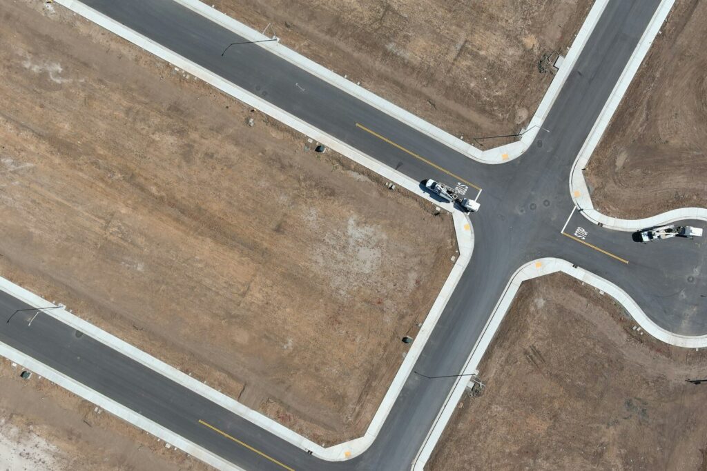 An aerial view of a four way intersection